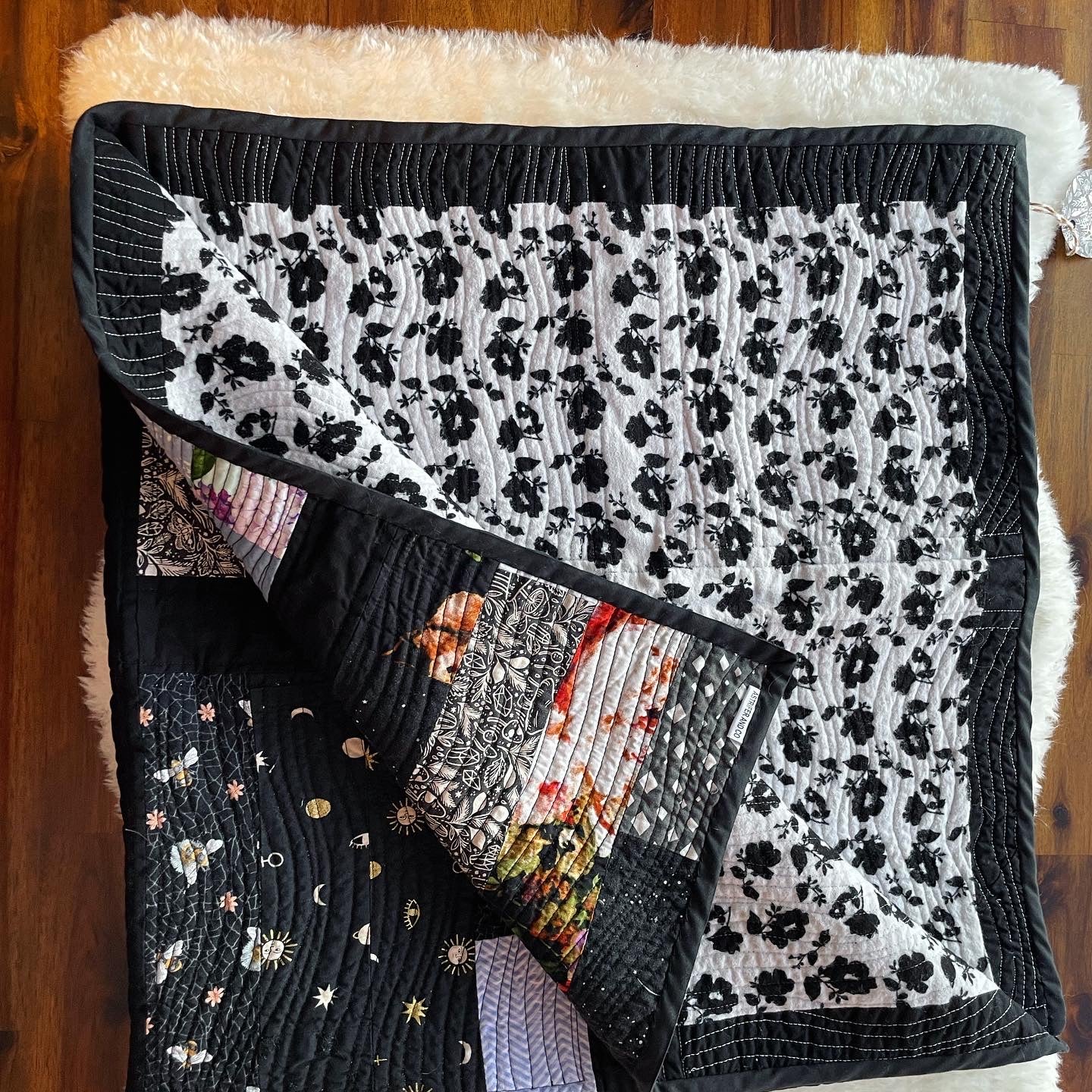 Quilt in Black, Blue, Violet and Grey.